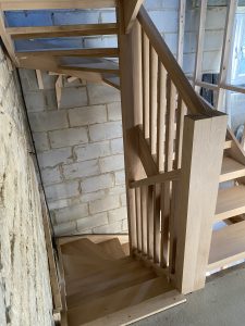 half way down wooden stair case